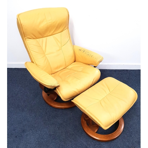 ERKONESS STRESSLESS ARMCHAIR
in pale yellow leather with a reclining back and rotating base, together with a matching footstool (2)