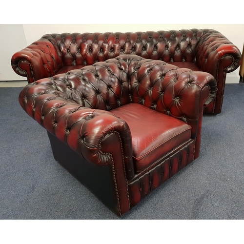 291 - CHESTERFIELD SOFA AND MATCHING CLUB ARMCHAIR
in ox blood leather, both with button backs and scroll ... 