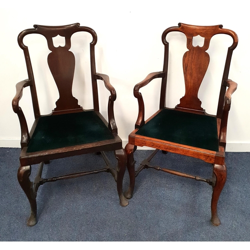 317 - PAIR OF GEORGE II OAK ARMCHAIRS
with a shaped and pierced back above a vase splat and shepherd crook... 