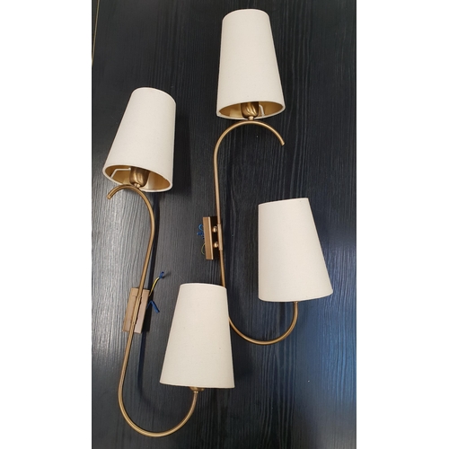 365 - TWO PAIRS OF BRASS WALL LIGHTS
each with rotating shaped arm with conical cream hessian shades, 74cm... 