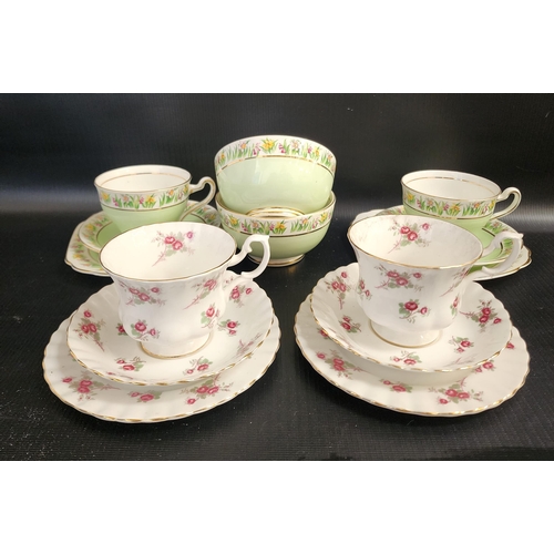 RICHMOND CHINA TEA SERVICE
decorated in the Rose Time pattern and comprising six cups, five saucers and six side plates; together with a Clare china tea service decorated with a white and green ground with a border of daffodils, comprising eight cups, twelve saucers, eleven side plates and two tea bowls (50)