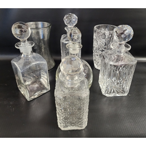 SELECTION OF CUT GLASS DECANTERS AND STOPPERS
and two vases