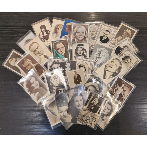 217 - LARGE SELECTION OF ACTORS POST CARDS
and publicity pictures, including Joan Crawford, Greta Garbo, S... 