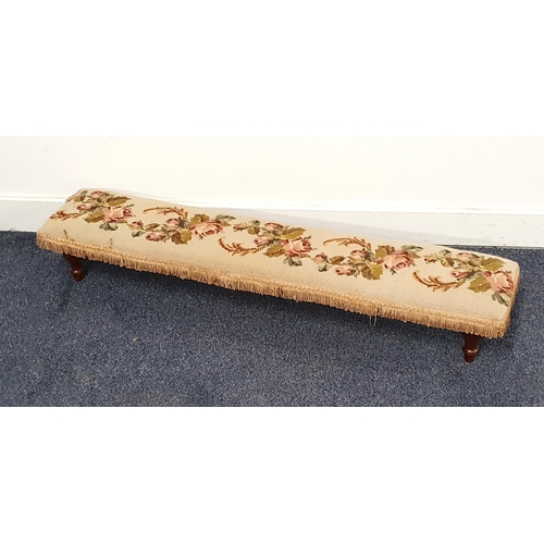 283 - ELONGATED NEEDLEWORK PRAYER STOOL
decorated with roses, on stout turned supports, 102cm long