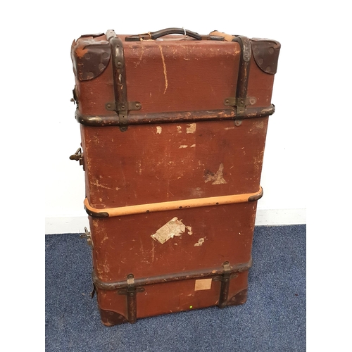 299 - VINTAGE TRAVEL TRUNK
with wood banding, the lift up lid opening to reveal a lift out tray, with side... 