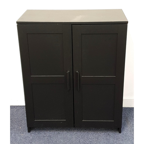 353 - BLACK LOW CUPBOARD
with a pair of panelled doors opening to reveal an adjustable shelf, 95.5cm high ... 