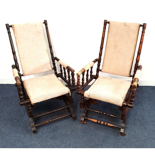 298 - NEAR MATCHING PAIR OF AMERICAN ROCKING CHAIRS
with turned decoration, padded backs, seats and arms, ... 