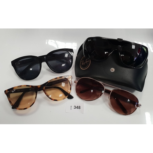 THREE PAIRS OF DSIGNER SUNGLASSES
including 2x Ray-Ban, Guess and Fossil (4)