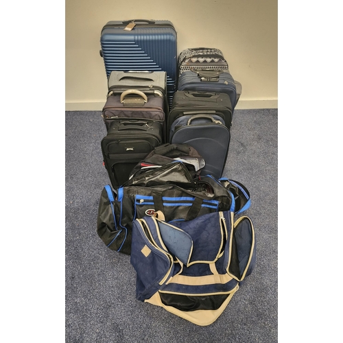 37 - SELECTION OF NINE SUITCASES TWO HOLDALLS AND ONE RUCKSACK
including Swisstourister, Free Flyer, East... 