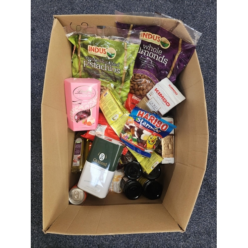 ONE BOX OF CONSUMABLE ITEMS
including coffee, olive oil, honey, all purpose seasoning, nuts, sweets and chocolate