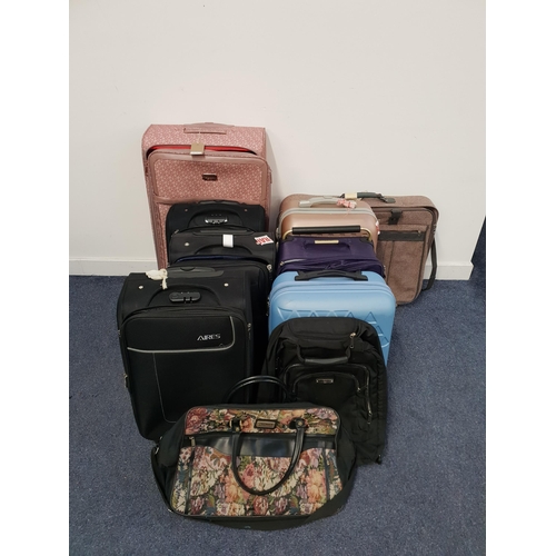 1 - SELECTION OF EIGHT SUITCASES, ONE HOLDALL AND ONE RUCKSACK
including DKNY, Aries, IT Luggage, Samson... 