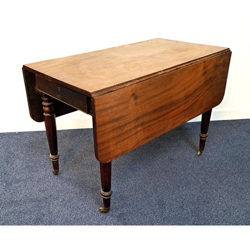 19th CENTURY MAHOGANY PEMBROKE TABLE
with shaped drop flaps above a frieze drawer and an opposing dummy drawer, standing on turned tapering supports with brass casters, 106.5cm wide