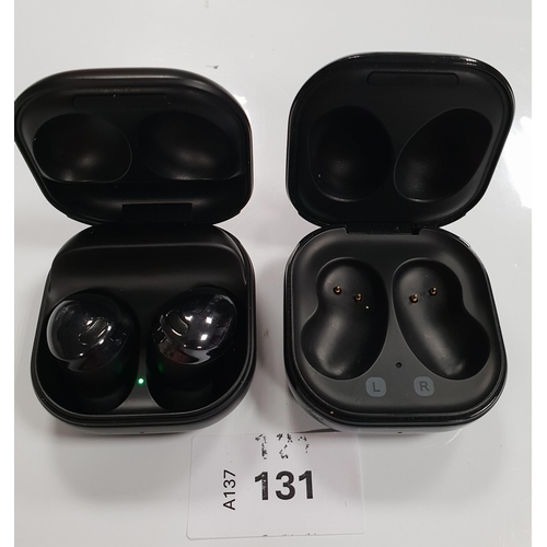 131 - PAIR OF SAMSUNG EARBUDS
in charging case, model SM-R190; together with an empty charging case for Sa... 