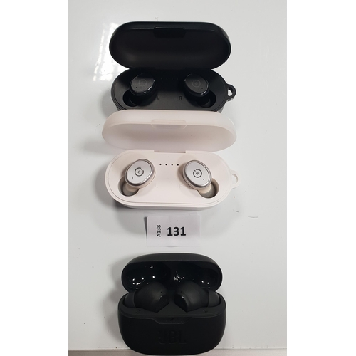 131 - TWO PAIRS OF TOZO AND ONE PAIR OF JBL EARBUDS
in charging cases