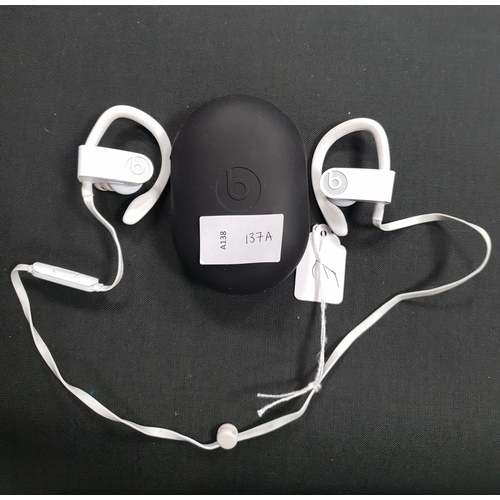 137A - PAIR OF BEATS POWERBEATS WIRED EARBUDS
model A1747, in beats silicon protective case