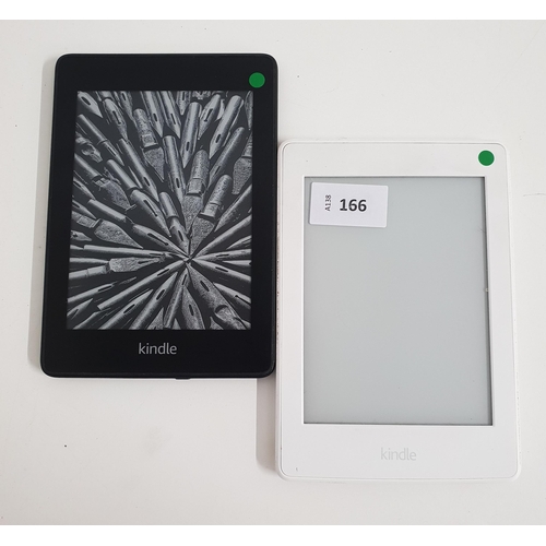 166 - TWO AMAZON KINDLE E-READERS
comprising a Paperwhite 3, serial number G090 KB03 7447 081W; and a Pape... 