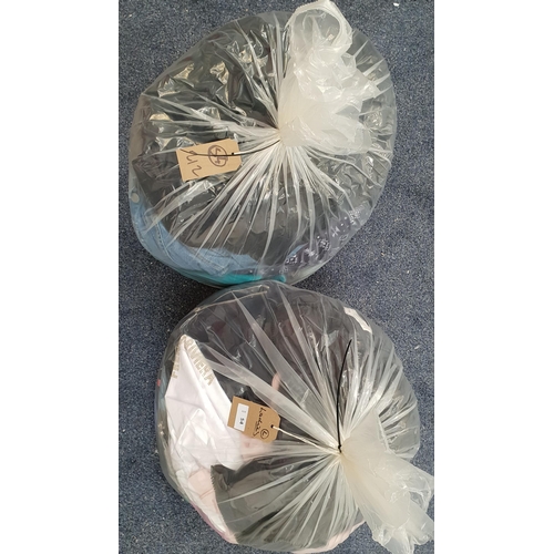 54 - TWO BAGS OF LADIES CLOTHING ITEMS
including Zara, Phase Eight, DKNY, John Lewis, M&S, etc.