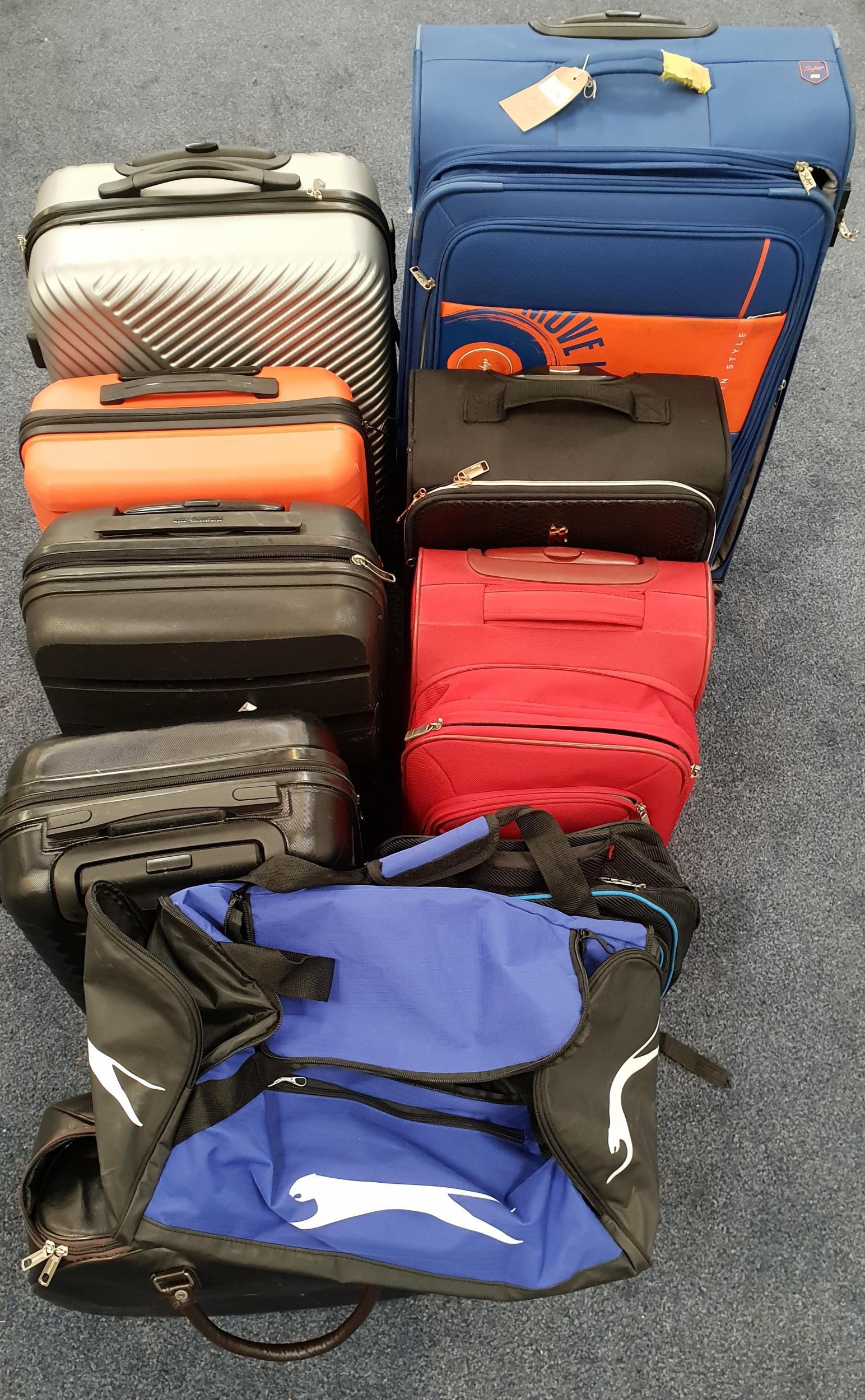 SELECTION OF SEVEN SUITCASES AND TWO HOLDALLS including American Tourister, Wauban, etc. Note Suitc