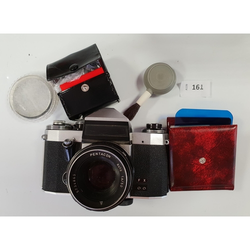 161 - 35MM FX CAMERA
marked Made in Germany (East); with Pentacon Auto 1.8/50 lens; together with coloured... 