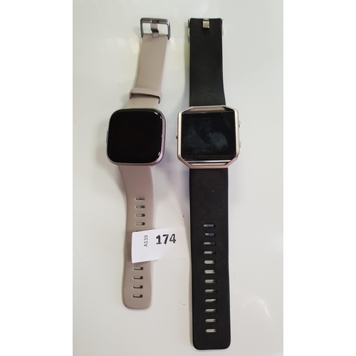 TWO FITBIT FITNESS TRACKERS
comprising a Versa 2 and a Blaze