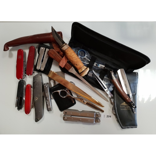 204 - SELECTION OF KNIVES AND SCISSORS, ETC.
including hair scissors and thinners, two Victorinox Swiss Ar... 