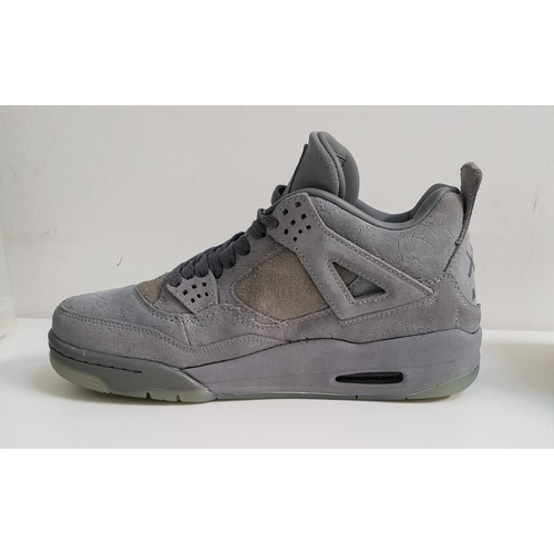 199 - PAIR OF KAWS X NIKE AIR JORDAN 4
in cool grey, UK size 9