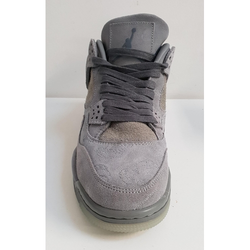 199 - PAIR OF KAWS X NIKE AIR JORDAN 4
in cool grey, UK size 9