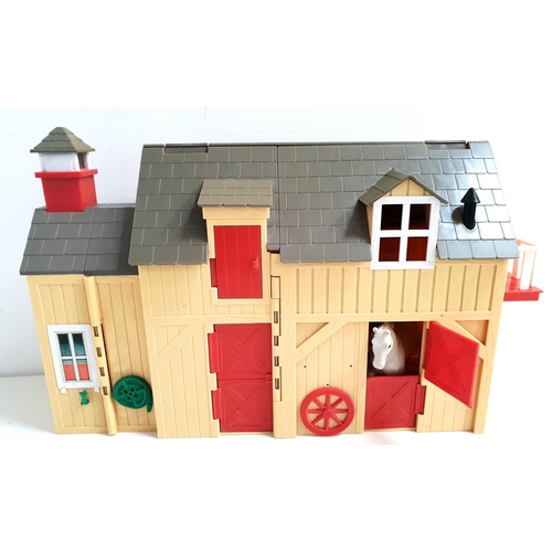 298 - BLUE BIRD AMY'S PONY TALES STABLE
with an opening roof revealing accommodation above the stables, to... 