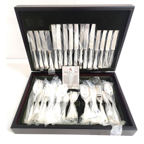 GEORGE WOOD & SONS CANTEEN OF SILVER PLATED CUTLERY
in the rat tail pattern for eight place settings, comprising table knives and forks, side knives and forks, soup and dessert spoons, four serving spoons and seven tea spoons, in a mahogany fitted case