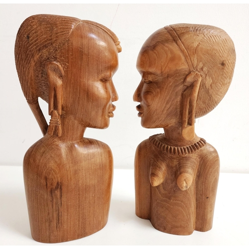 TWO AFRICAN CARVED BUSTS
depicting a tribal man and woman, 28cm high (2)