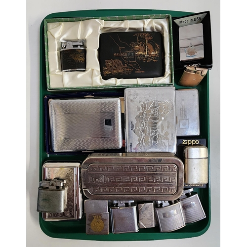 SELECTION OF SMOKING REQUISITES
comprising a rolling tobacco tin, six metal cigarette cases, three Zippo lighters and seven other cigarette lighters and a Rolls Razor