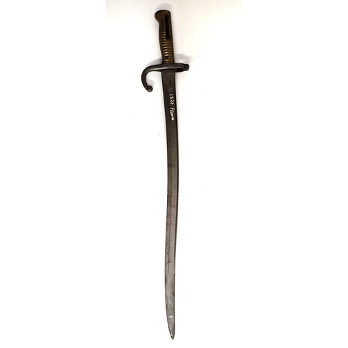 306 - FRENCH CHASSEPOT BAYONET
with a shaped 57.5cm long blade, brass ribbed handle with operating release... 