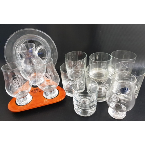 MIXED LOT OF COMMEMRATIVE GLASSWARE
including a Glencairn trio of water jug and two glasses engraved Glasgow & District Rotary Curling Club, seven whisky tumblers engraved Rotary Club & Curling, and other glassware