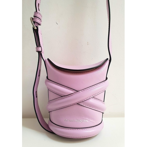 271 - ALEXANDER MCQUEEN CURVE MINI BUCKET BAG
in lilac leather, the flap with magnetic closure, approximat... 