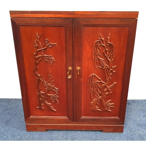 343 - CHINESE TEAK HOME BAR
with a fold out top above carved back and front panels opening to to reveal a ... 