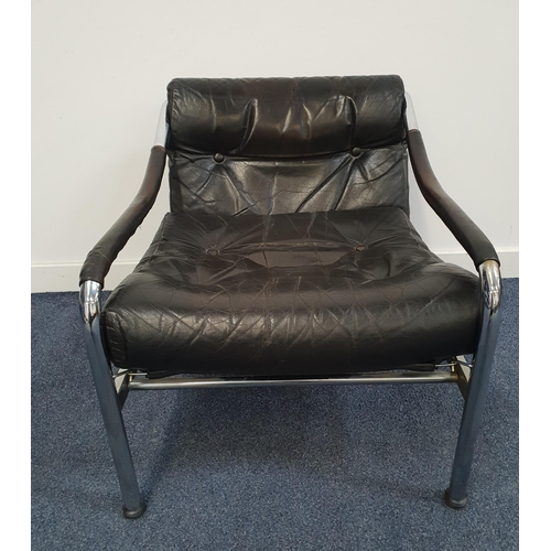 347 - TIM BATES FOR PIEFF ARMCHAIR
with a chrome tubular frame and a black leather button back and seat cu... 