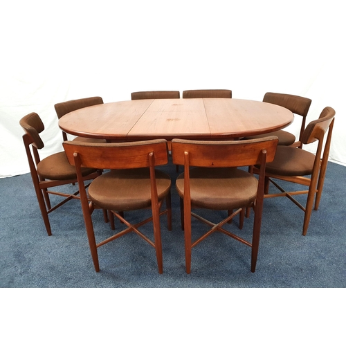 350 - G PLAN TEAK DINING TABLE AND CHAIRS
with a pull apart top revealing a fold out leaf, standing on tur... 