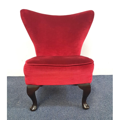 421 - 1950s ARMCHAIR
with a shaped padded back and circular padded seat, on cabriole front supports, toget... 