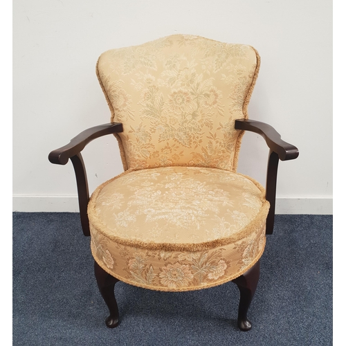 421 - 1950s ARMCHAIR
with a shaped padded back and circular padded seat, on cabriole front supports, toget... 