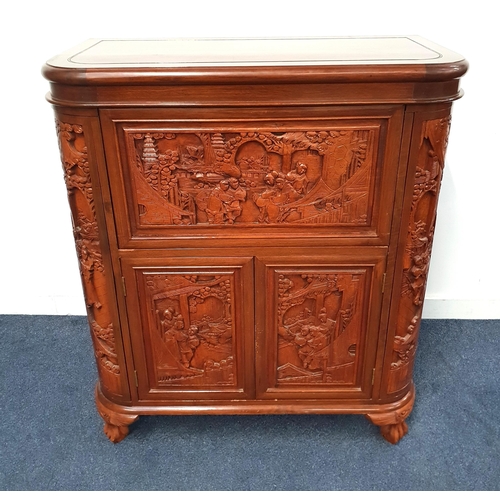 402 - CHINESE CARVED TEAK HOME BAR
with a D shaped lift up lid revealing a carved interior depicting warri... 