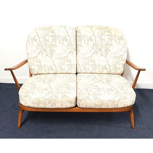 430 - ERCOL WINDSOR SOFA
the arched stick back with loose seat and back cushions, 132cm wide