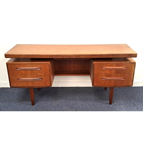 369 - G PLAN TEAK DRESSING TABLE
now lacking its mirrored back, with an arrangement of five drawers, stand... 