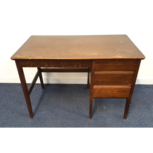 426 - VINTAGE CARSONS OAK OFFICE DESK
with four off set drawers, standing on plain supports united by a st... 