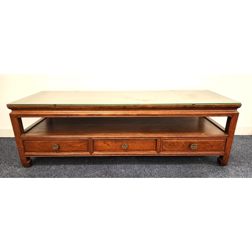 345 - CHINESE HARDWOOD OCCASIONAL TABLE
the rectangular top above an open shelf with three push through dr... 