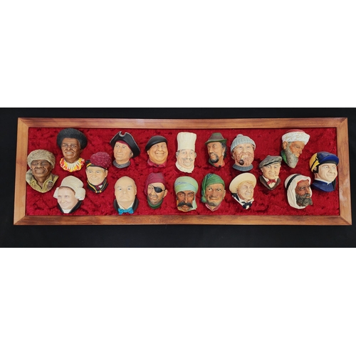 260 - EIGHTEEN BOSSON PLASTER HEADS
comprising Laplander, York, Fijian, Old Lady, Sir Winston Churchill, C... 