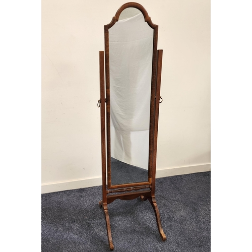 364 - WALNUT CHEVAL MIRROR
with an arched plain plate, standing on splayed supports, 158cm high