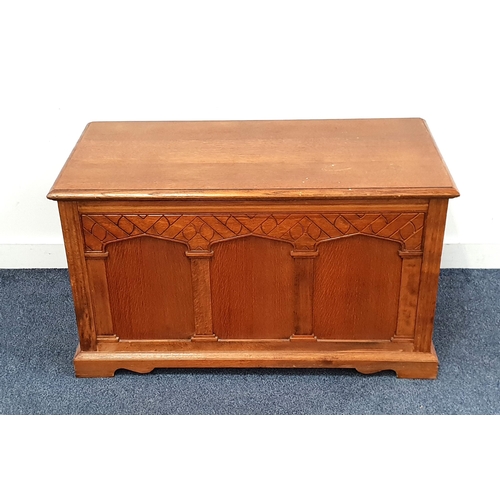 441 - OAK COFFER
with a moulded lift up lid above a panelled front, 53cm x 92cm x 44.5cm