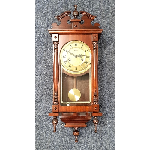 456 - LINCOLN WALL CLOCK
in a mahogany case with a circular brass dial, 75cm high