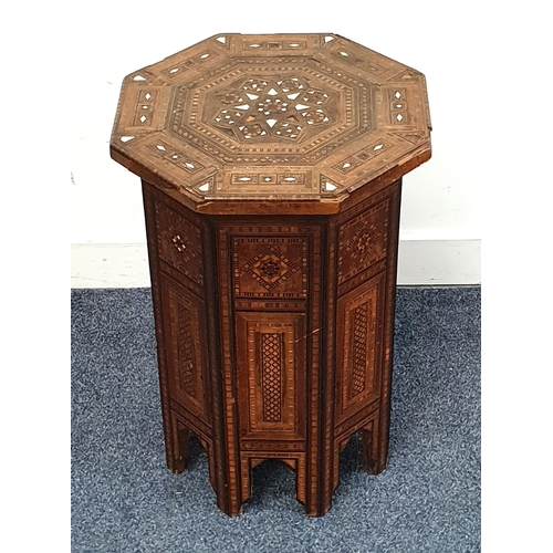 460 - VINTAGE MIDDLE EASTERN OCTAGONAL OCCASIONAL TABLE
with mother of pearl, teak, walnut and ebony inlay... 