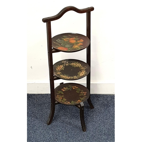 462 - DECORATIVE OAK CAKE STAND
with three circular fixed tiers decorated with fruit and flowers, 74cm hig... 